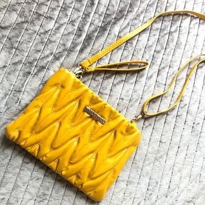 Mustard yellow MIU MIU cross body/wristlet